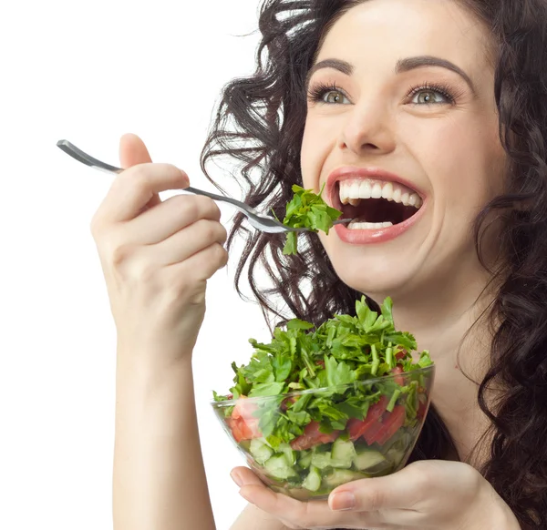 Mulher está comendo salada de salat — Fotografia de Stock