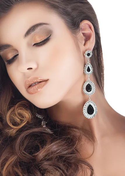 Woman with jewelry earrings — Stock Photo, Image