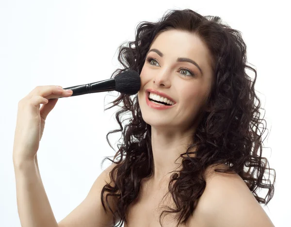 Brunette with make up brush — Stock Photo, Image