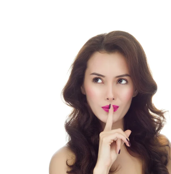 Woman with finger on her lips gesturing shh — Stock Photo, Image