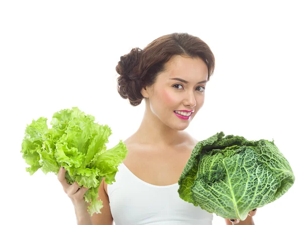 Donna con insalata e cavolo — Foto Stock