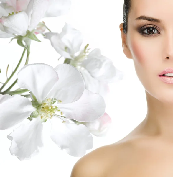 Woman with blossom white flowers — Stock Photo, Image