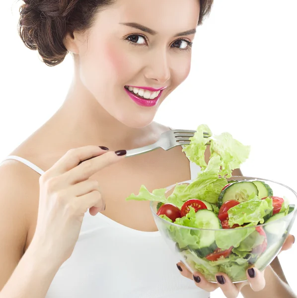 Mulher está comendo salat — Fotografia de Stock