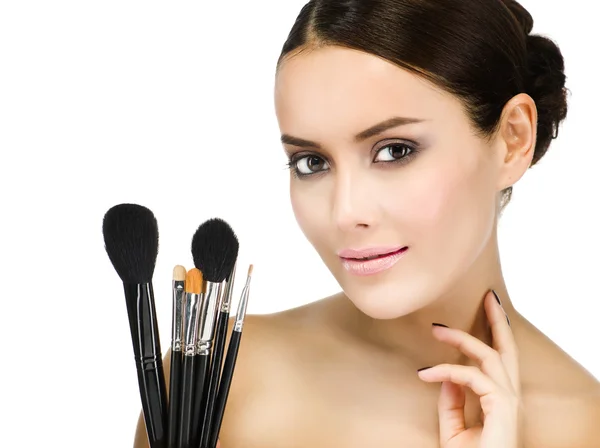 Woman with make up brushes — Stock Photo, Image