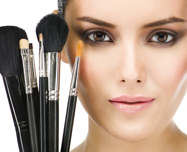 Woman with make up brushes — Stock Photo, Image