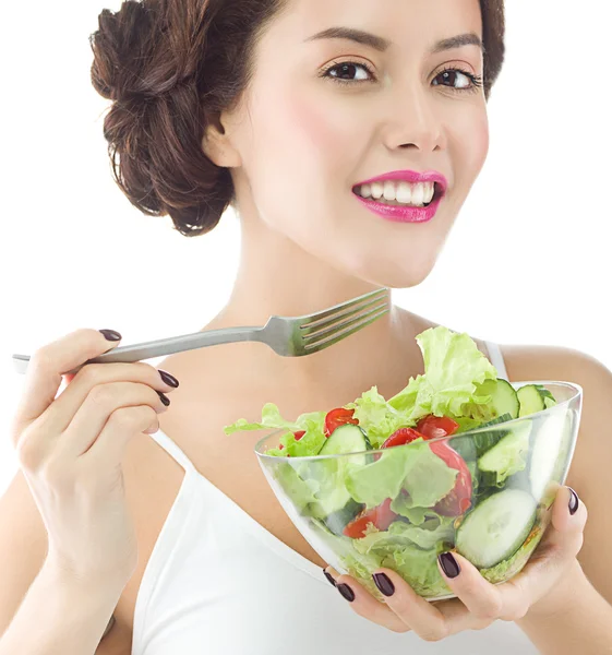 Mulher está comendo salat — Fotografia de Stock