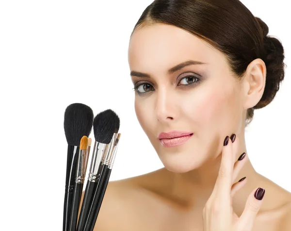 Woman with make up brushes — Stock Photo, Image