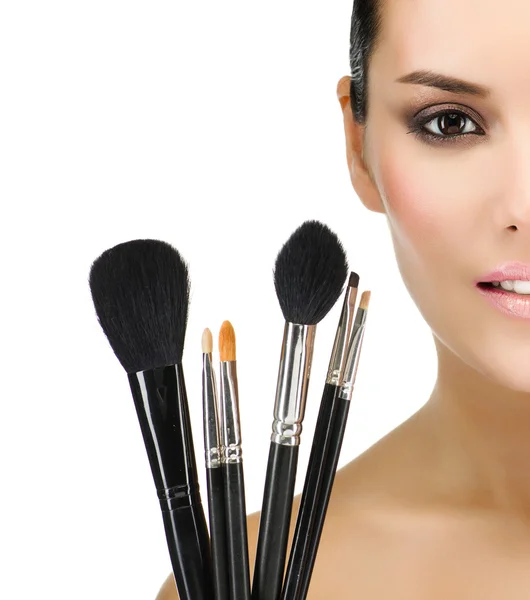 Woman with make up brushes — Stock Photo, Image
