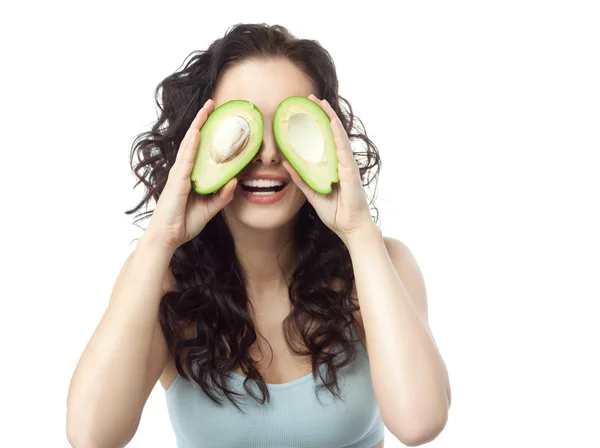 Vrouw met avocado — Stockfoto