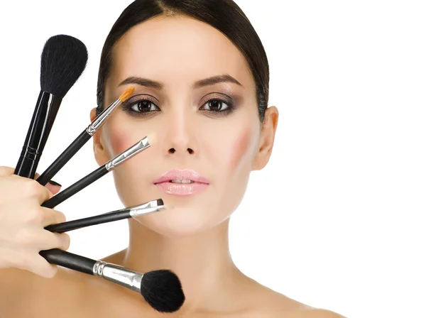 Woman with make up brushes — Stock Photo, Image