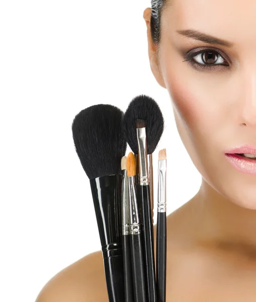 Donna con make up pennelli — Foto Stock