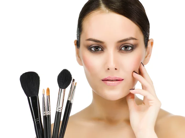 Woman with make up brushes — Stock Photo, Image