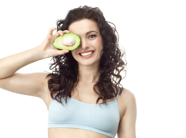 Vrouw met avocado — Stockfoto