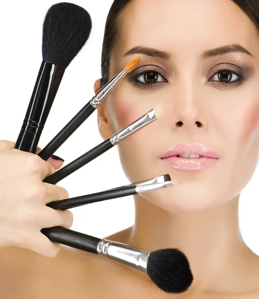 Woman with make up brushes — Stock Photo, Image