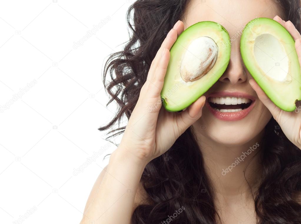 Woman with avocado