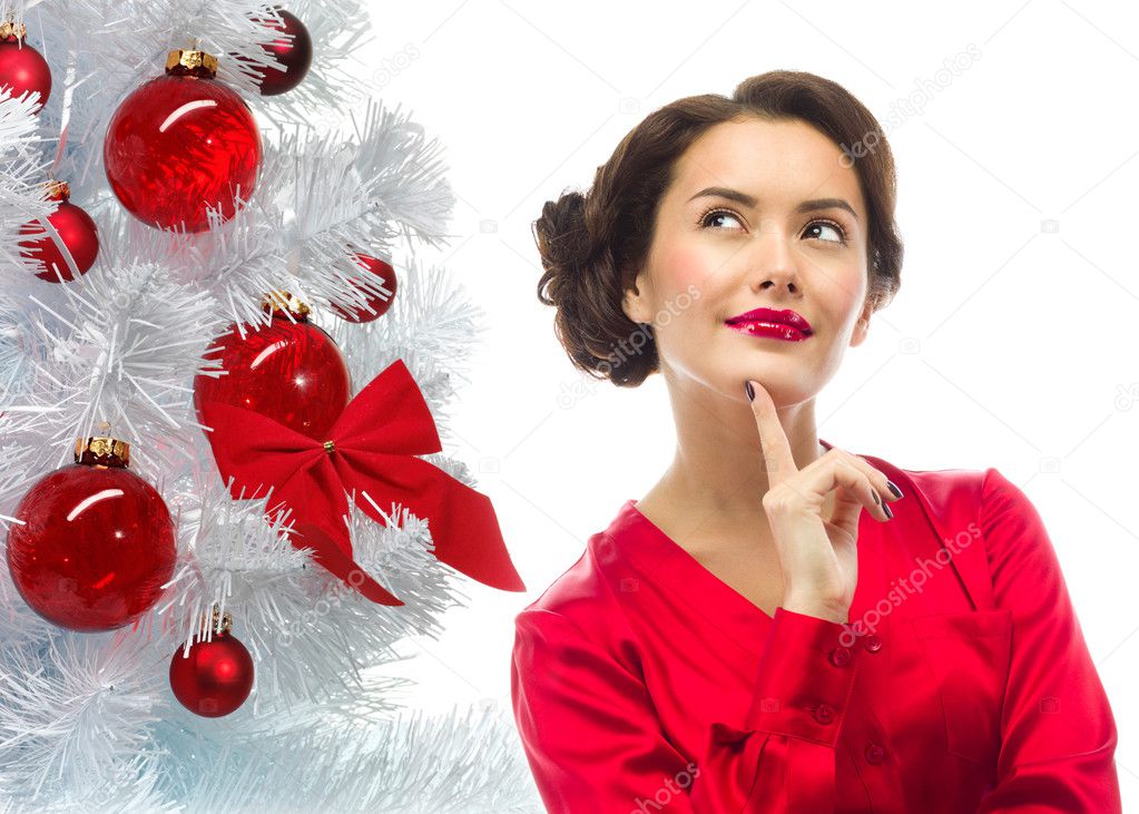 Woman over cristmas tree
