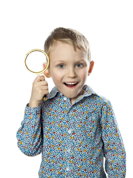 Girl with magnifying glass — Stock Photo, Image