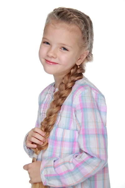 Retrato de uma menina bonita com um pigtail — Fotografia de Stock
