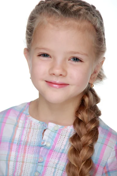 Portrait of a beautiful girl with a pigtail — Stock Photo, Image