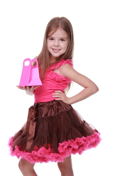 Happy girl holding gift — Stock Photo, Image
