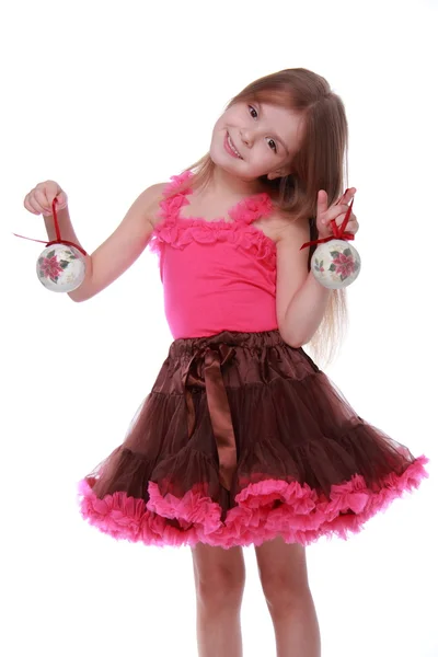 Little girl with a Christmas toy — Stock Photo, Image