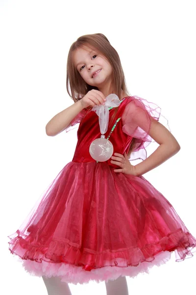 Little girl with a Christmas toy — Stock Photo, Image