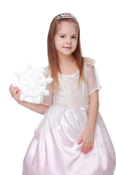 Christmas girl with snowflake in hands — Stock Photo, Image