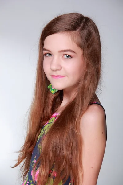 Teenager in a flower dress — Stock Photo, Image