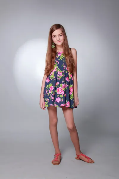 Teenager in a flower dress — Stock Photo, Image