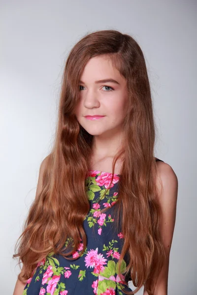 Teenager in a flower dress — Stock Photo, Image