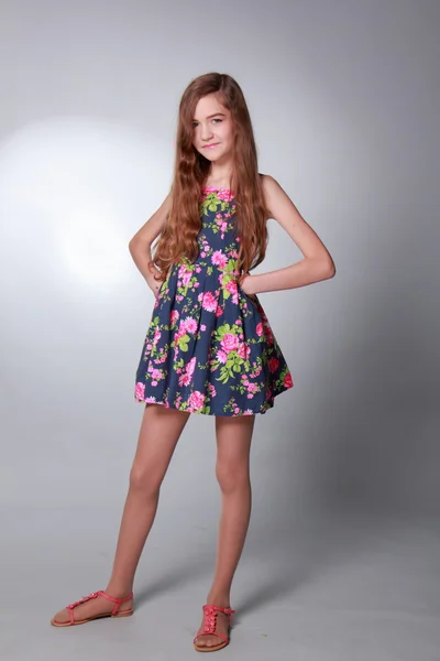 Teenager in a flower dress — Stock Photo, Image