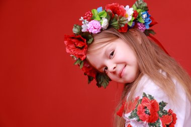 Image of cute little girl dressed in traditional Ukrainian on Valentine Day clipart