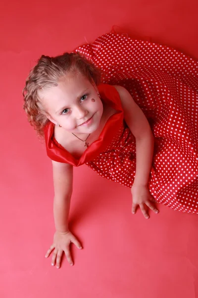 Little girl in a polka dot dress — Stock Photo, Image