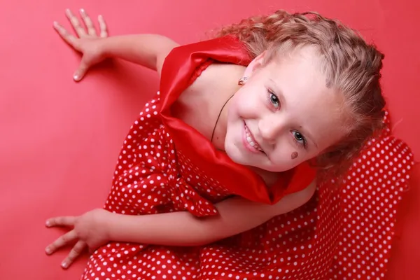 Little girl in a polka dot dress — Stock Photo, Image