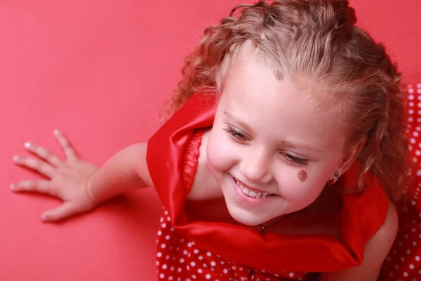 Little girl in a polka dot dress — Stock Photo, Image