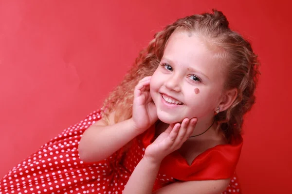 Little girl in a polka dot dress — Stock Photo, Image