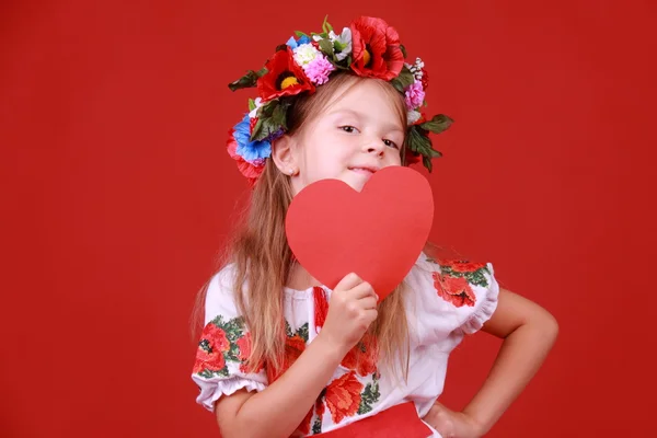 Menina com um coração — Fotografia de Stock