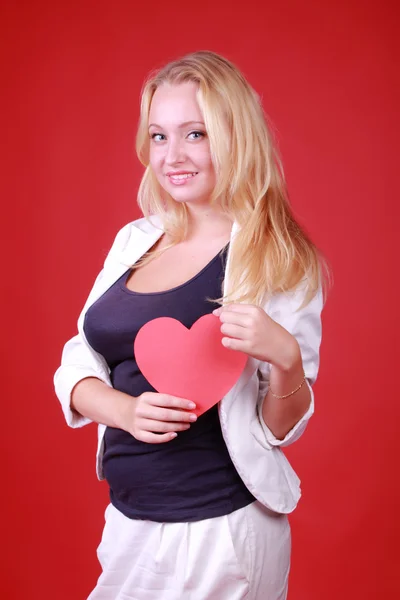 Menina com símbolo de coração — Fotografia de Stock