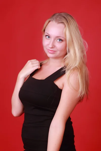 Blonde in a black dress — Stock Photo, Image