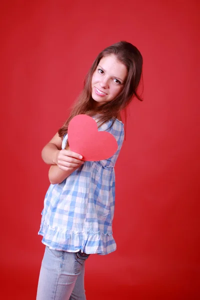Menina com símbolo de coração — Fotografia de Stock