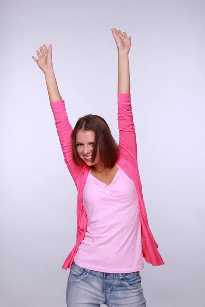 Fröhliches Mädchen in rosa — Stockfoto