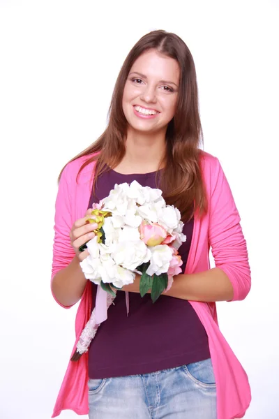 Vacker vår kvinna med blommor — Stockfoto