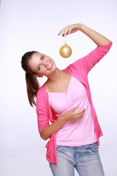 Girl with a Christmas toy — Stock Photo, Image