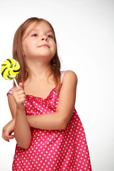 Little girl with lollipop — Stock Photo, Image