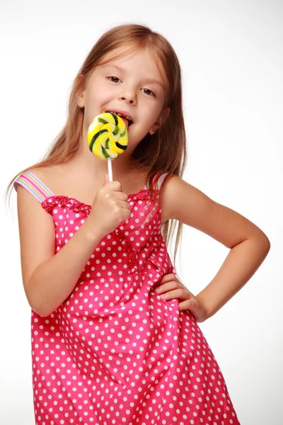 Niña con piruleta — Foto de Stock