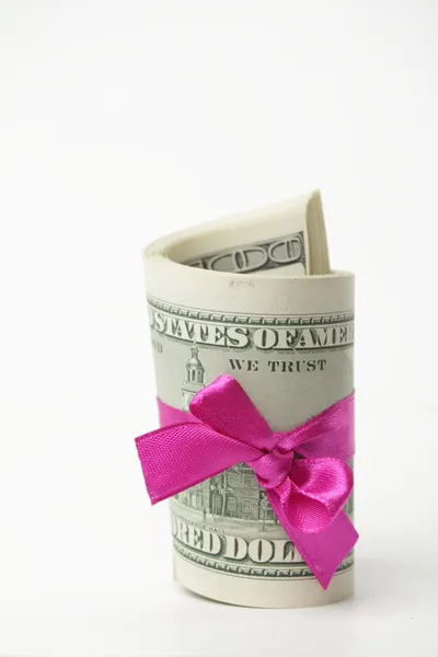 US dollar wrapped by purple ribbon — Stock Photo, Image