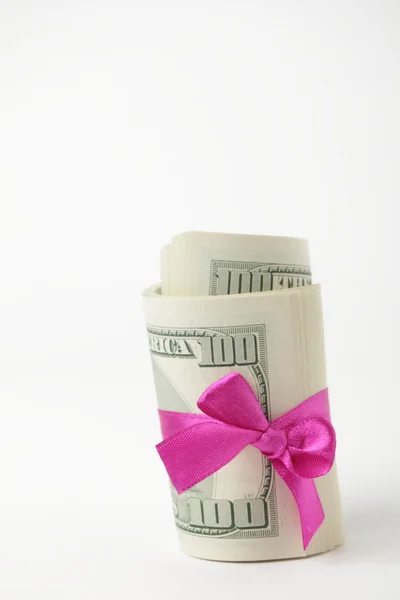US dollar wrapped by purple ribbon — Stock Photo, Image