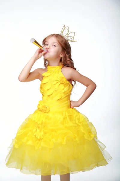 Cute Princess in a yellow dress and a crown — Stock Photo, Image