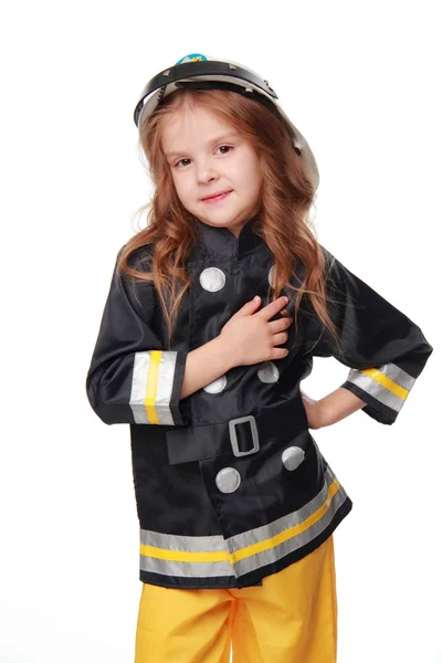 Happy girl firefighter — Stock Photo, Image