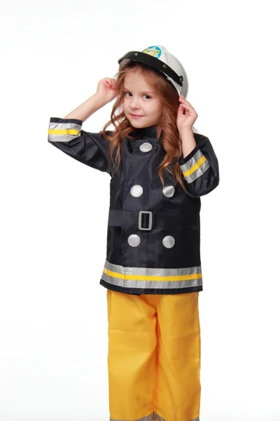 Szczęśliwa dziewczyna strażak — Zdjęcie stockowe